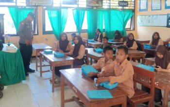 Polsek Madapangga Kawal Pendistribusian 3.415 Paket Makan Bergizi Gratis di 44 Sekolah